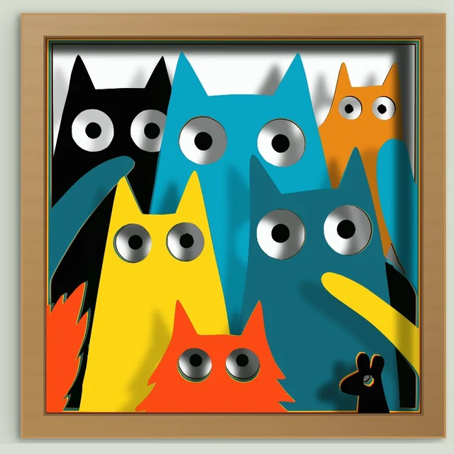 The same cats as paper layers in a wooden shadow box frame