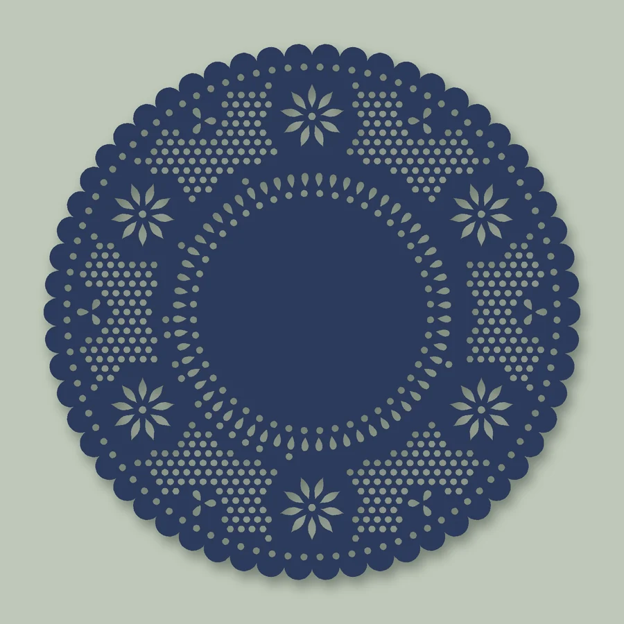 A navy round doily with a ring of drops around a solid circle