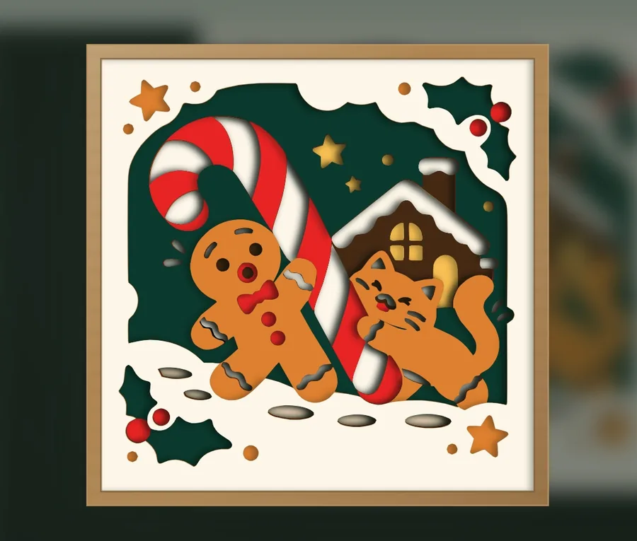 Finished gingerbread cat and gingerbread man layered papercut in a frame