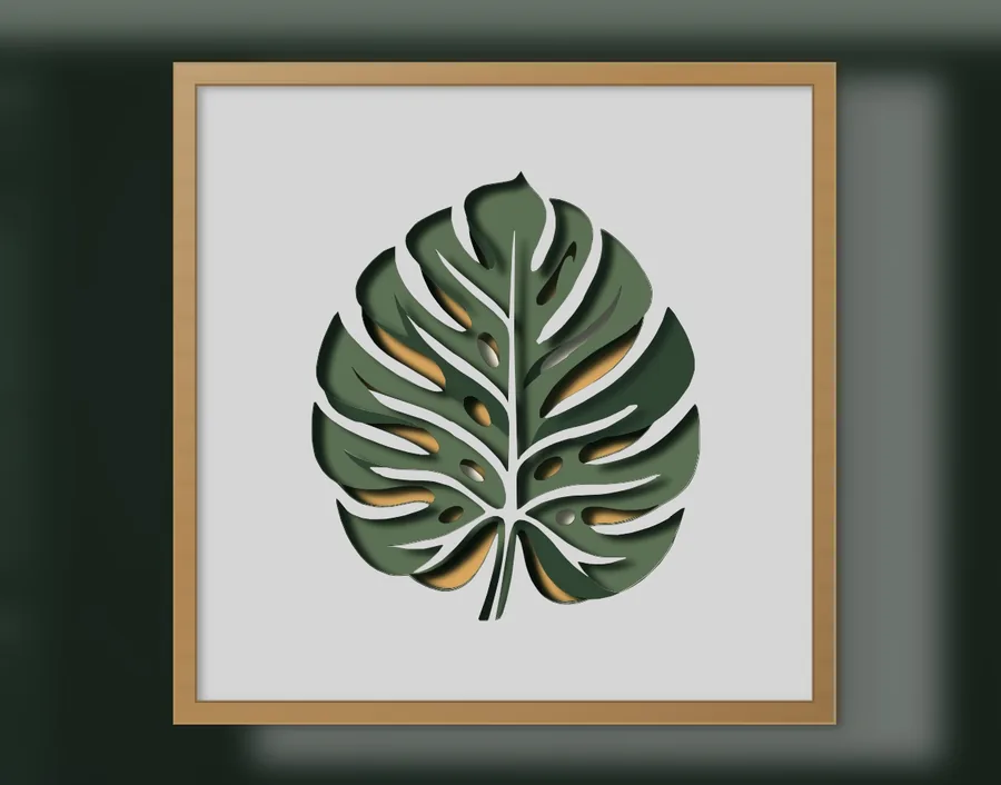 Finished monstera leaf layered papercut in a frame