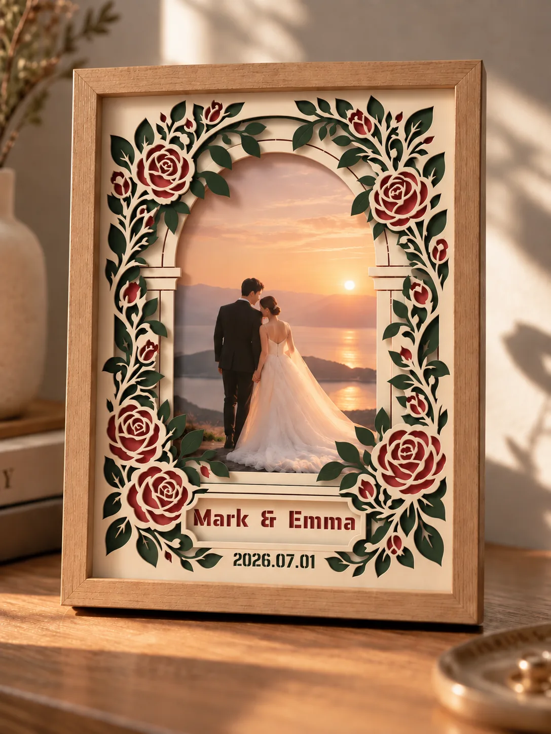 Wedding anniversary layered papercut frame displayed on a table